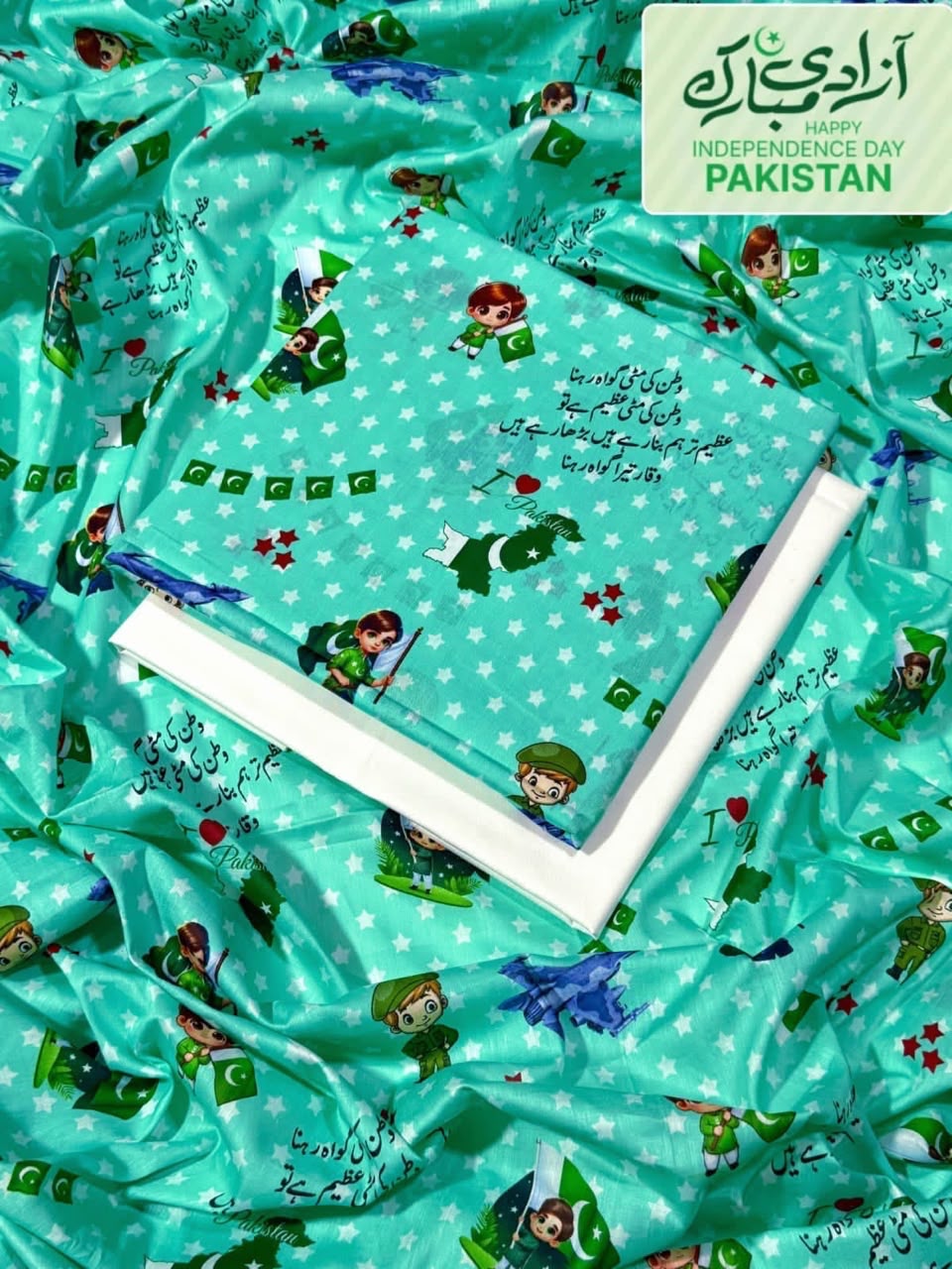 "green embroidered lawn suit front view"
